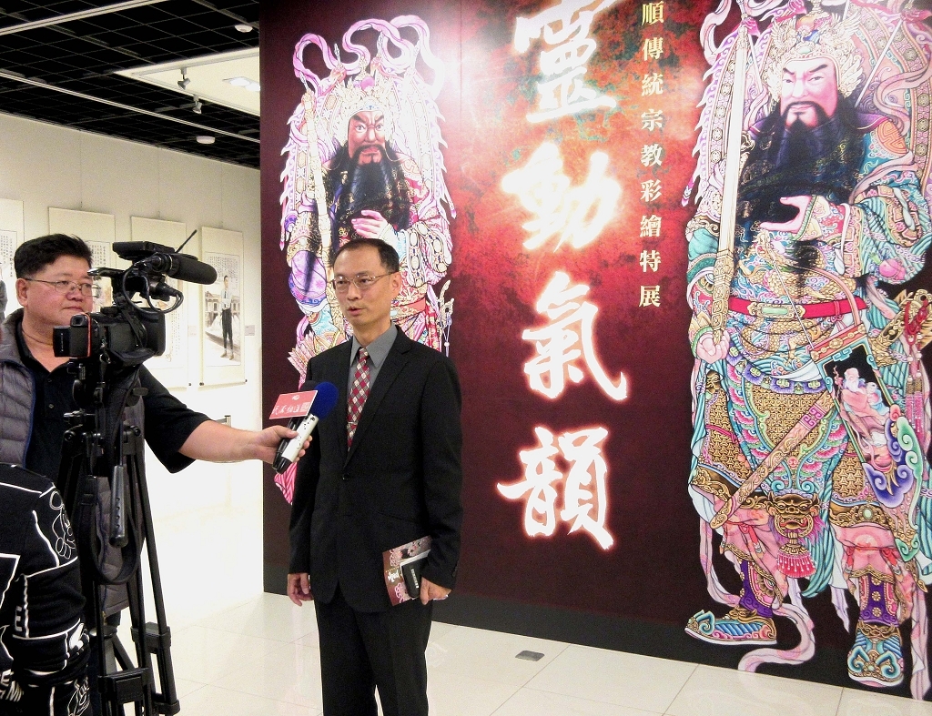 圖12：王希智主任秘書接受媒體採訪